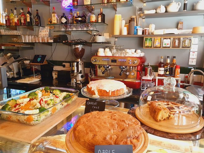The deli counter and espresso machine inside Fiori