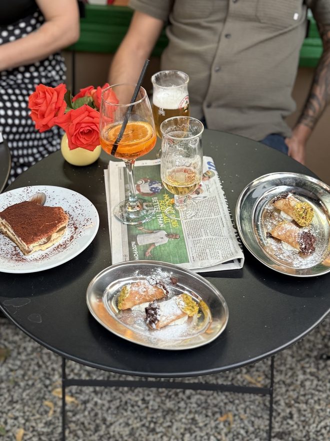 Dessert and drinks at an outdoor table